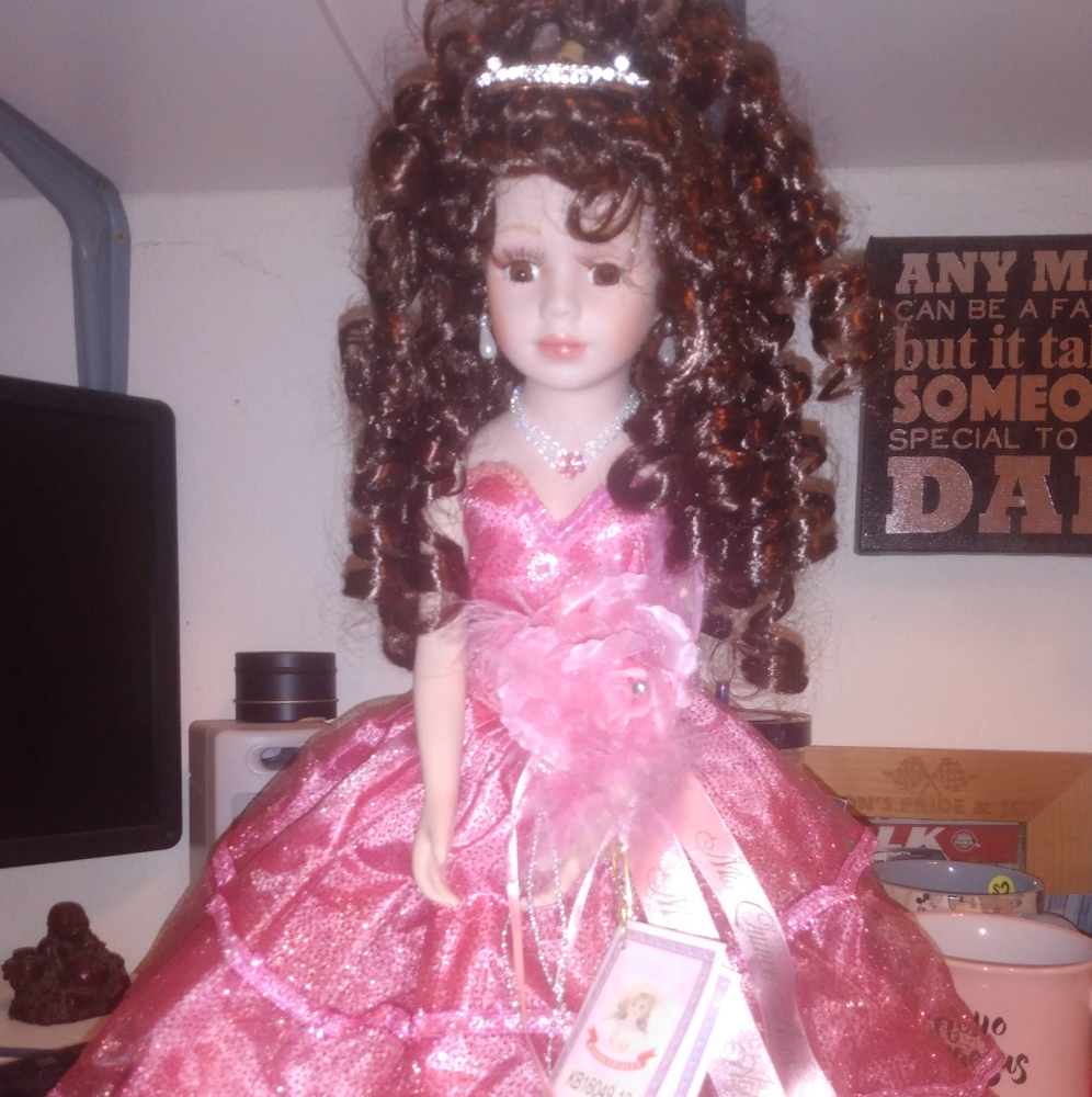 Porcelain quince doll